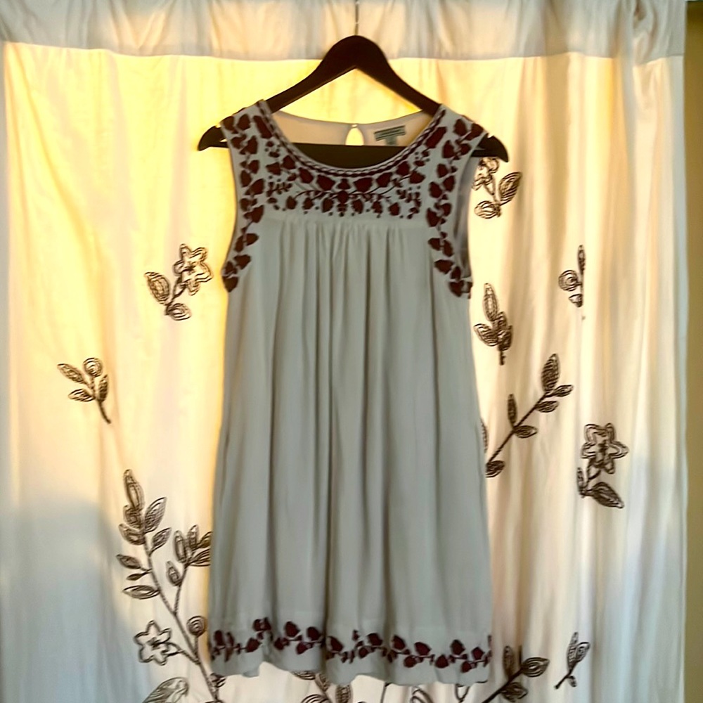 Lovely embroidered details. T stand dress. On purpose!